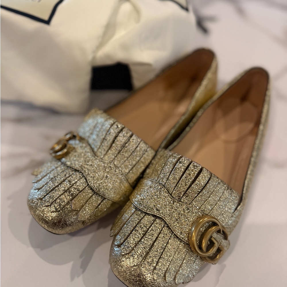 Gucci Metallic Gold Fringe Loafers with Double G Accent